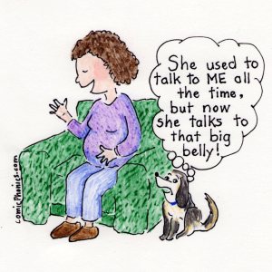 Pregnant mom talking to baby in womb.