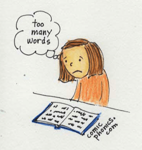 Discouraged child thinks there are too many words in a book she is reading