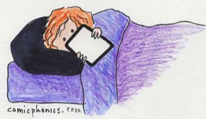 girl with ipad in bed